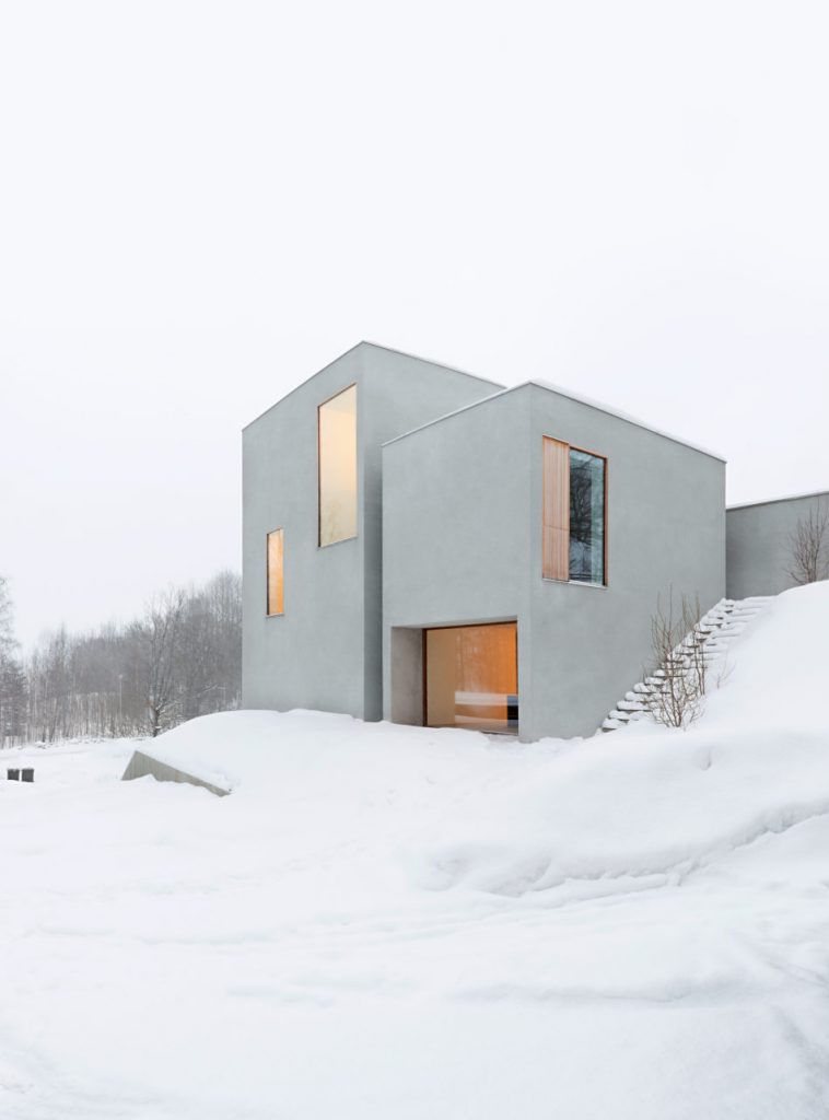 Small White Building In Snow